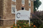 Cobblestone Museum sign